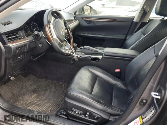 2015 Lexus ES 330 with VIN JTHBK1GGXF2154853, listed as a Copart auction lot 64828665 with 75,119 mi miles and Salvage title. Bid and sale history available at DreamBid. Image 7.