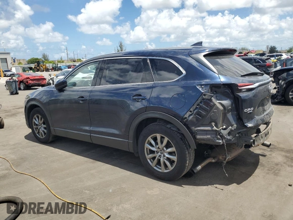 2018 Mazda CX-9 Touring with VIN JM3TCBCY3J0235048, listed as a Copart auction lot 61043915 with 82,869 mi miles and Salvage title. Bid and sale history available at DreamBid. Image 2.