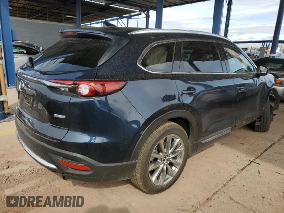2018 Mazda CX-9 Grand Touring z VIN JM3TCADY2J0220873, wystawiony jako Copart lot #49264875 z przebiegiem Nie podano mil oraz Szkoda całkowita • Salvage title. Historia ofert i sprzedaży dostępna na DreamBid. Obrazek 3.