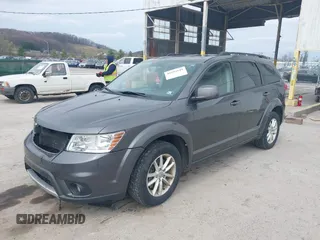2014 Dodge Journey SXT z VIN 3C4PDDBG2ET161528, wystawiony jako IAAI lot #41932649 z przebiegiem 161 597 mil mil oraz . Historia ofert i sprzedaży dostępna na DreamBid. Obrazek 17.