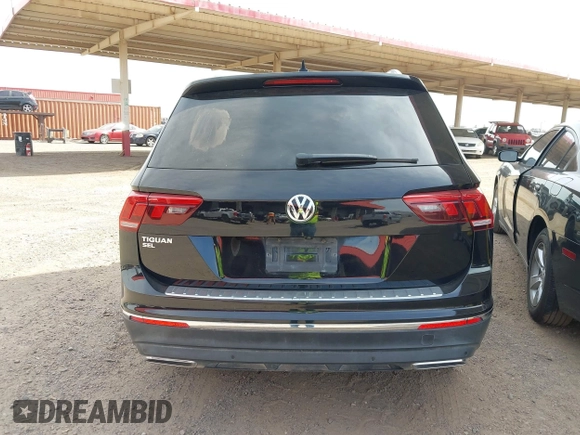 2020 Volkswagen Tiguan SE z VIN 3VV3B7AX7LM039084, wystawiony jako IAAI lot #42249016 z przebiegiem 126 763 mil mil oraz . Historia ofert i sprzedaży dostępna na DreamBid. Obrazek 16.