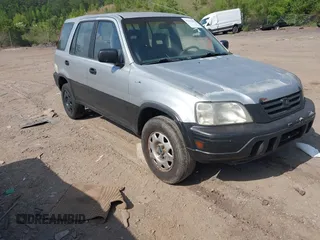 1998 Honda CR-V LX with VIN JHLRD2841WC018466, listed as a IAAI auction lot 42142021 with 184,505 mi miles. Bid and sale history available at carsss.com. Image 1.
