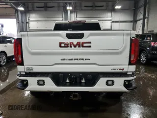 2020 GMC Sierra 3500HD AT4 z VIN 1GT49VEY9LF268615, wystawiony jako Copart lot #83497714 z przebiegiem Nie podano mil oraz Nie do naprawy. Historia ofert i sprzedaży dostępna na DreamBid. Obrazek 6.