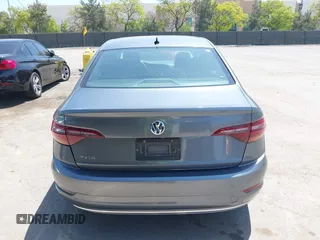 2019 Volkswagen Jetta S z VIN 3VWC57BUXKM074708, wystawiony jako IAAI lot #42151448 z przebiegiem 189 430 mil mil oraz . Historia ofert i sprzedaży dostępna na DreamBid. Obrazek 16.