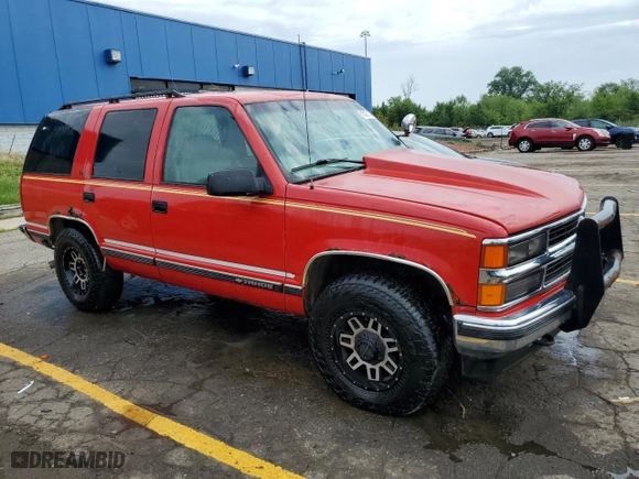 1999 Chevrolet Tahoe Z71 with VIN 1GNEK13R9XJ476615, listed as a Copart auction lot 61312114 with 174,729 mi miles and Clean Title. Bid and sale history available at carsss.com. Image 4.