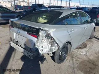 2019 Toyota Prius L Eco with VIN JTDKARFU3K3082893, listed as a IAAI auction lot 41370727 with 217,582 mi miles. Bid and sale history available at carsss.com. Image 4.