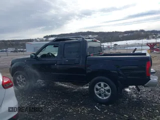 2004 Nissan Frontier SVE with VIN 1N6MD27Y84C457511, listed as a IAAI auction lot 41294955 with 266,174 mi miles and . Bid and sale history available at DreamBid. Image 14.