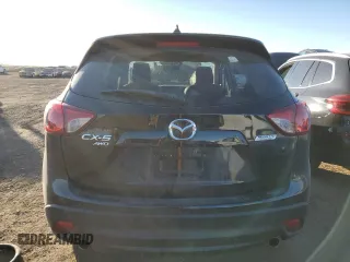 2016 Mazda CX-5 Grand Touring with VIN JM3KE4DY0G0731384, listed as a Copart auction lot 44741695 with 58,727 mi miles and Salvage Title. Bid and sale history available at carsss.com. Image 6.