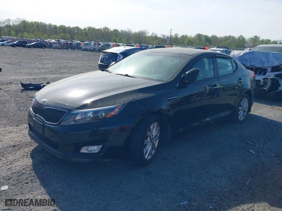 2015 Kia Optima LX with VIN KNAGM4A71F5630673, listed as a IAAI auction lot 42106584 with 245,005 mi miles. Bid and sale history available at carsss.com. Image 2.