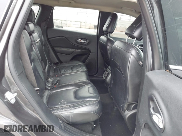 2014 Jeep Cherokee Limited with VIN 1C4PJLDS9EW241875, listed as a IAAI auction lot 42062856 with 90,052 mi miles and . Bid and sale history available at DreamBid. Image 8.