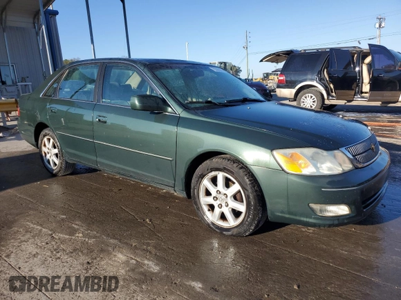 2001 Toyota Avalon XL z VIN 4T1BF28B81U162506, wystawiony jako Copart lot #52031805 z przebiegiem 212 437 mil mil oraz Szkody całkowita. Historia ofert i sprzedaży dostępna na DreamBid. Obrazek 4.