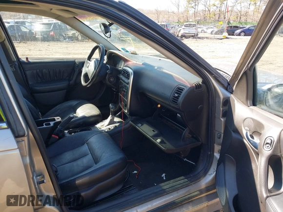 2003 Saturn LS with VIN 1G8JU54F43Y546465, listed as a IAAI auction lot 41896175 with 999,999 mi miles. Bid and sale history available at carsss.com. Image 5.