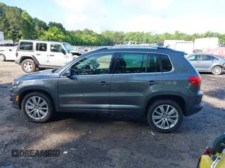 2013 Volkswagen Tiguan S with VIN WVGAV3AX7DW624136, listed as a IAAI auction lot 42256657 with 124,000 mi miles and . Bid and sale history available at DreamBid. Image 14.