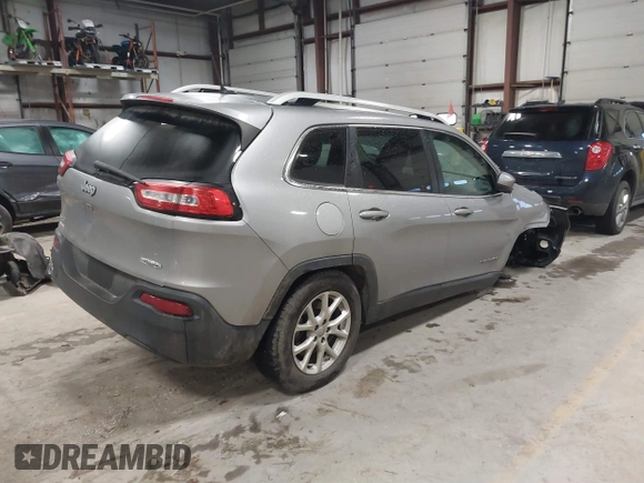 2016 Jeep Cherokee Altitude with VIN 1C4PJMCB6GW295404, listed as a IAAI auction lot 41211758 with 100,722 mi miles and . Bid and sale history available at DreamBid. Image 4.