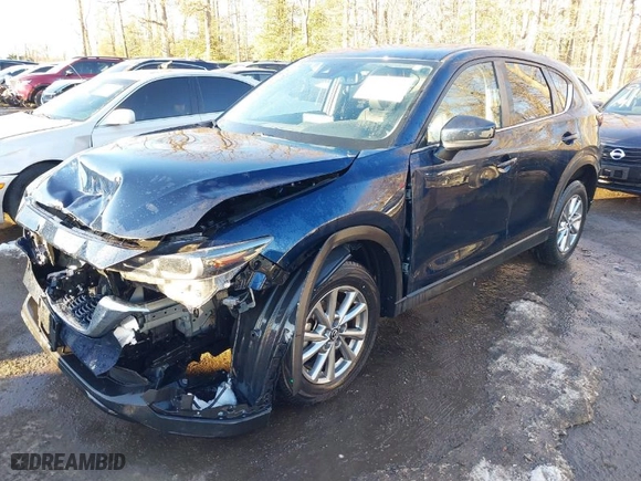 2022 Mazda CX-5 2.5 S Carbon Edition with VIN JM3KFBCM4N0566968, listed as a IAAI auction lot 41312448 with NaN miles. Bid and sale history available at carsss.com. Image 2.