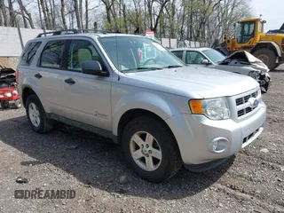 2011 Ford Escape Hybrid z VIN 1FMCU4K37BKC29245, wystawiony jako IAAI lot #42081077 z przebiegiem 154 345 mil mil oraz . Historia ofert i sprzedaży dostępna na DreamBid. Obrazek 1.