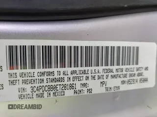 2014 Dodge Journey SXT with VIN 3C4PDCBB0ET281861, listed as a IAAI auction lot 42187485 with 124,191 mi miles and . Bid and sale history available at DreamBid. Image 9.