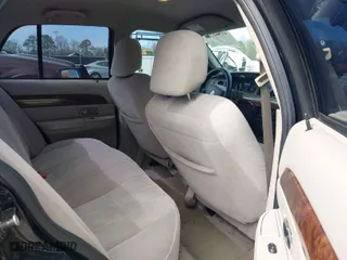 2006 Mercury Grand Marquis GS with VIN 2MEFM74W26X632447, listed as a IAAI auction lot 41564231 with 131,563 mi miles. Bid and sale history available at carsss.com. Image 8.