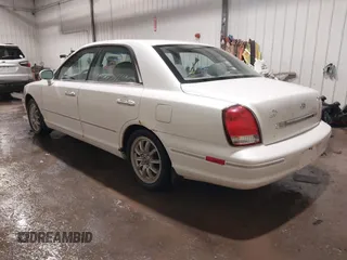 2002 Hyundai XG L z VIN KMHFU45EX2A180204, wystawiony jako IAAI lot #41472564 z przebiegiem 148 333 mil mil oraz . Historia ofert i sprzedaży dostępna na DreamBid. Obrazek 3.