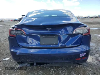 2019 Tesla Model 3 Mid Range with VIN 5YJ3E1EA8KF299456, listed as a Copart auction lot 48152695 with 27,144 mi miles and Salvage Title. Bid and sale history available at DreamBid. Image 6.