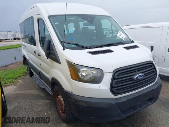 2016 Ford Transit Passenger XL z VIN 1FBZX2CM2GKB51339, wystawiony jako IAAI lot #41429005 z przebiegiem 215 896 mil mil oraz . Historia ofert i sprzedaży dostępna na DreamBid. Obrazek 1.