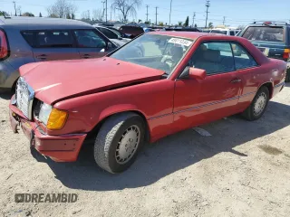 1990 Mercedes-Benz 300 CE with VIN WDBEA51D7LB137591, listed as a Copart auction lot 49811234 with 23,385 mi miles and Salvage Title. Bid and sale history available at carsss.com. Image 1.