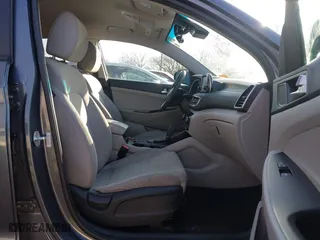 2019 Hyundai Tucson Value with VIN KM8J33A49KU860842, listed as a IAAI auction lot 41735224 with 57,197 mi miles. Bid and sale history available at carsss.com. Image 5.