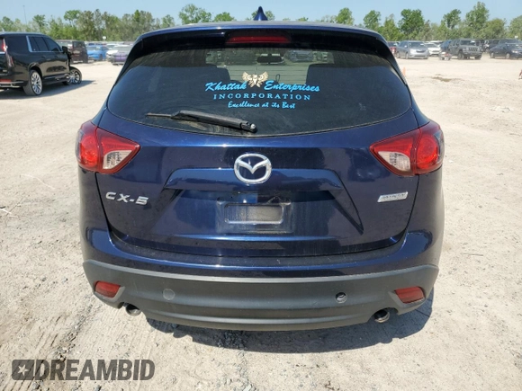 2013 Mazda CX-5 Grand Touring with VIN JM3KE2DE4D0147902, listed as a Copart auction lot 52696685 with 331,168 mi miles and Clean Title. Bid and sale history available at carsss.com. Image 6.