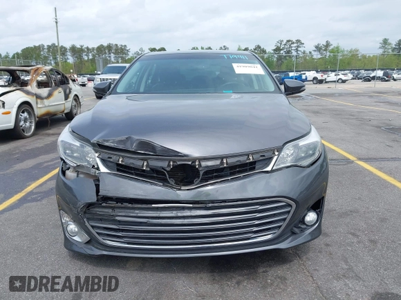 2013 Toyota Avalon XLE with VIN 4T1BK1EB8DU019702, listed as a IAAI auction lot 41909041 with 79,819 mi miles and . Bid and sale history available at DreamBid. Image 13.