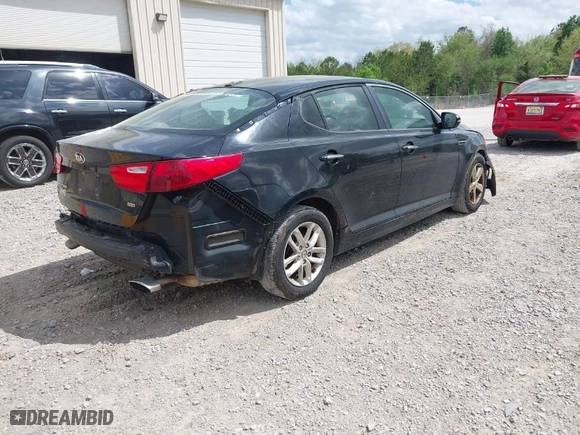 2015 Kia Optima LX with VIN 5XXGM4A77FG487033, listed as a IAAI auction lot 41974724 with 173,451 mi miles. Bid and sale history available at carsss.com. Image 4.