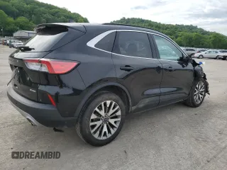 2021 Ford Escape Titanium with VIN 1FMCU9J97MUA57521, listed as a Copart auction lot 58714055 with 83,201 mi miles and Salvage title. Bid and sale history available at DreamBid. Image 3.