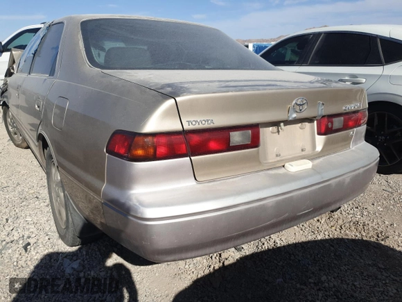 1999 Toyota Camry LE z VIN JT2BF28K5X0200853, wystawiony jako Copart lot #50666075 z przebiegiem Nie podano mil oraz Nie do naprawy • Non repairable. Historia ofert i sprzedaży dostępna na DreamBid. Obrazek 6.