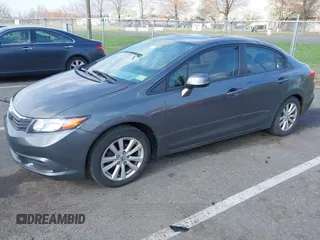 2012 Honda Civic EX-L with VIN 2HGFB2F94CH307646, listed as a IAAI auction lot 42006923 with 260,917 mi miles and . Bid and sale history available at DreamBid. Image 19.