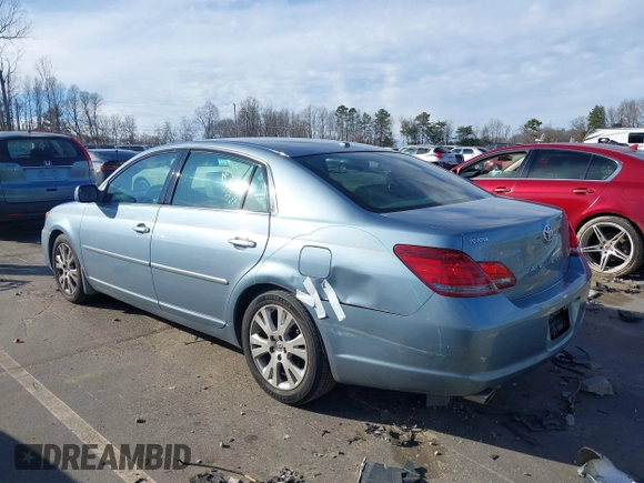 2009 Toyota Avalon XL with VIN 4T1BK36B19U350297, listed as a IAAI auction lot 41589714 with 141,003 mi miles. Bid and sale history available at carsss.com. Image 3.