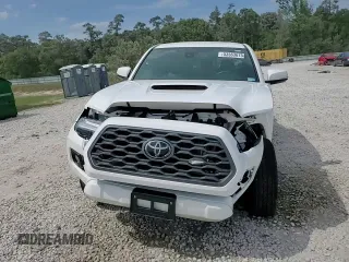 2023 Toyota Tacoma SR5 z VIN 3TMAZ5CN2PM217085, wystawiony jako Copart lot #53563675 z przebiegiem 7 389 mil mil oraz Szkoda całkowita • Salvage title. Historia ofert i sprzedaży dostępna na DreamBid. Obrazek 13.