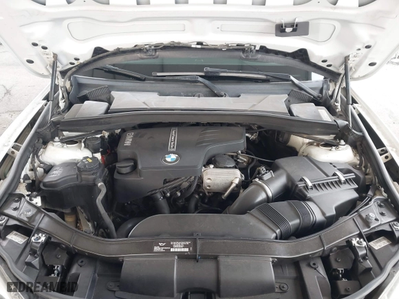 2015 BMW X1 sDrive28i with VIN WBAVM1C53FV318663, listed as a IAAI auction lot 41711526 with 182,204 mi miles. Bid and sale history available at carsss.com. Image 10.