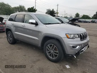 2018 Jeep Grand Cherokee Limited with VIN 1C4RJFBG4JC105495, listed as a Copart auction lot 59544875 with 147,271 mi miles and Salvage title. Bid and sale history available at DreamBid. Image 4.
