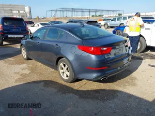 2015 Kia Optima LX with VIN KNAGM4A71F5568868, listed as a IAAI auction lot 42431920 with 138,217 mi miles and . Bid and sale history available at DreamBid. Image 3.