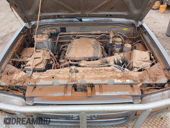2001 Isuzu Trooper S with VIN JACDJ58XX17J18173, listed as a IAAI auction lot 42142403 with Not provided miles and . Bid and sale history available at DreamBid. Image 10.