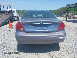 2000 Ford Taurus SE with VIN 1FAFP53U1YG213906, listed as a IAAI auction lot 42064922 with 117,043 mi miles and . Bid and sale history available at carsss.com. Image 12.