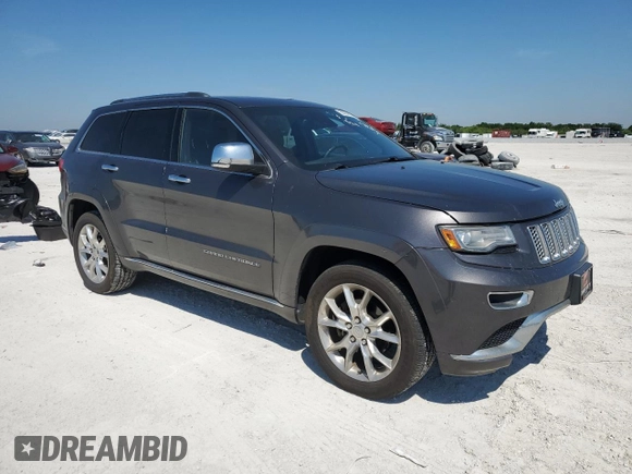 2014 Jeep Grand Cherokee Summit with VIN 1C4RJFJGXEC159438, listed as a Copart auction lot 50864595 with 134,558 mi miles and Salvage title. Bid and sale history available at DreamBid. Image 4.