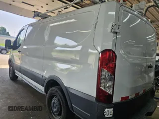 2015 Ford Transit Cargo z VIN 1FTNR1ZM8FKA55185, wystawiony jako IAAI lot #42515954 z przebiegiem 86 918 mil mil oraz . Historia ofert i sprzedaży dostępna na DreamBid. Obrazek 5.