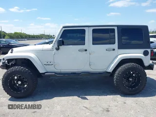 2010 Jeep Wrangler z VIN 1J4HB5H16AL186600, wystawiony jako IAAI lot #42147992 z przebiegiem 134 717 mil mil oraz . Historia ofert i sprzedaży dostępna na DreamBid. Obrazek 14.