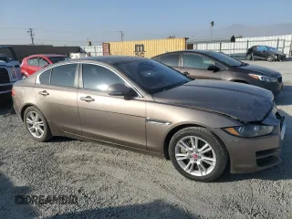 2017 Jaguar XE 25t Premium with VIN SAJAD4BG6HA957704, listed as a Copart auction lot 83630294 with 114,794 mi miles and Salvage Title. Bid and sale history available at carsss.com. Image 4.