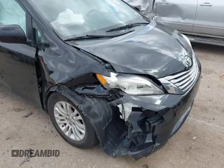2016 Toyota Sienna XLE z VIN 5TDYK3DC6GS718551, wystawiony jako IAAI lot #41537134 z przebiegiem 114 839 mil mil oraz . Historia ofert i sprzedaży dostępna na DreamBid. Obrazek 6.
