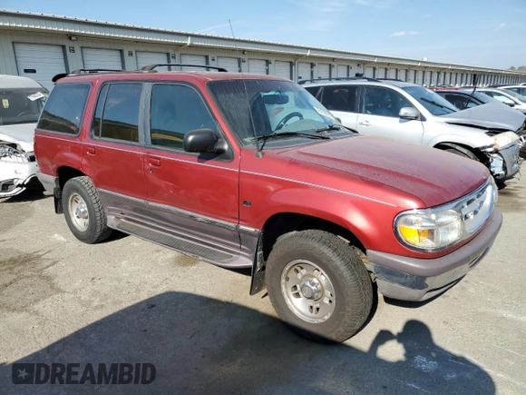 1997 Ford Explorer XLT with VIN 1FMDU35PXVUA56388, listed as a Copart auction lot 78156994 with 185,864 mi miles and Salvage title. Bid and sale history available at DreamBid. Image 4.