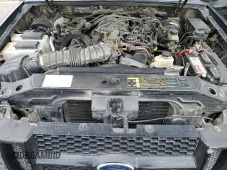 2005 Ford Explorer Sport Trac XLS z VIN 1FMZU67K15UB77562, wystawiony jako Copart lot #59619895 z przebiegiem 122 810 mil mil oraz Szkoda całkowita • Salvage title. Historia ofert i sprzedaży dostępna na DreamBid. Obrazek 11.