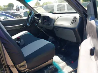 1998 Ford F-150 with VIN 1FTZF1720WNB96004, listed as a IAAI auction lot 42577043 with 271,652 mi miles and . Bid and sale history available at DreamBid. Image 5.