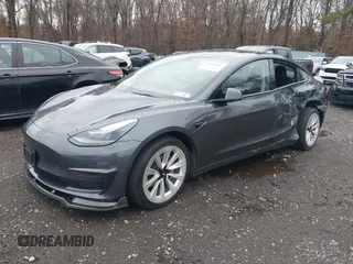 2022 Tesla Model 3 with VIN 5YJ3E1EA6NF143839, listed as a IAAI auction lot 40905007 with 83,897 mi miles and . Bid and sale history available at DreamBid. Image 18.