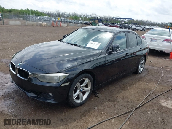 2014 BMW 3 Series 328i xDrive with VIN WBA3B3C58EJ982424, listed as a IAAI auction lot 42075568 with 190,009 mi miles. Bid and sale history available at carsss.com. Image 2.
